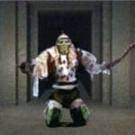 Tess shoots Duncan with a Tommy Gun